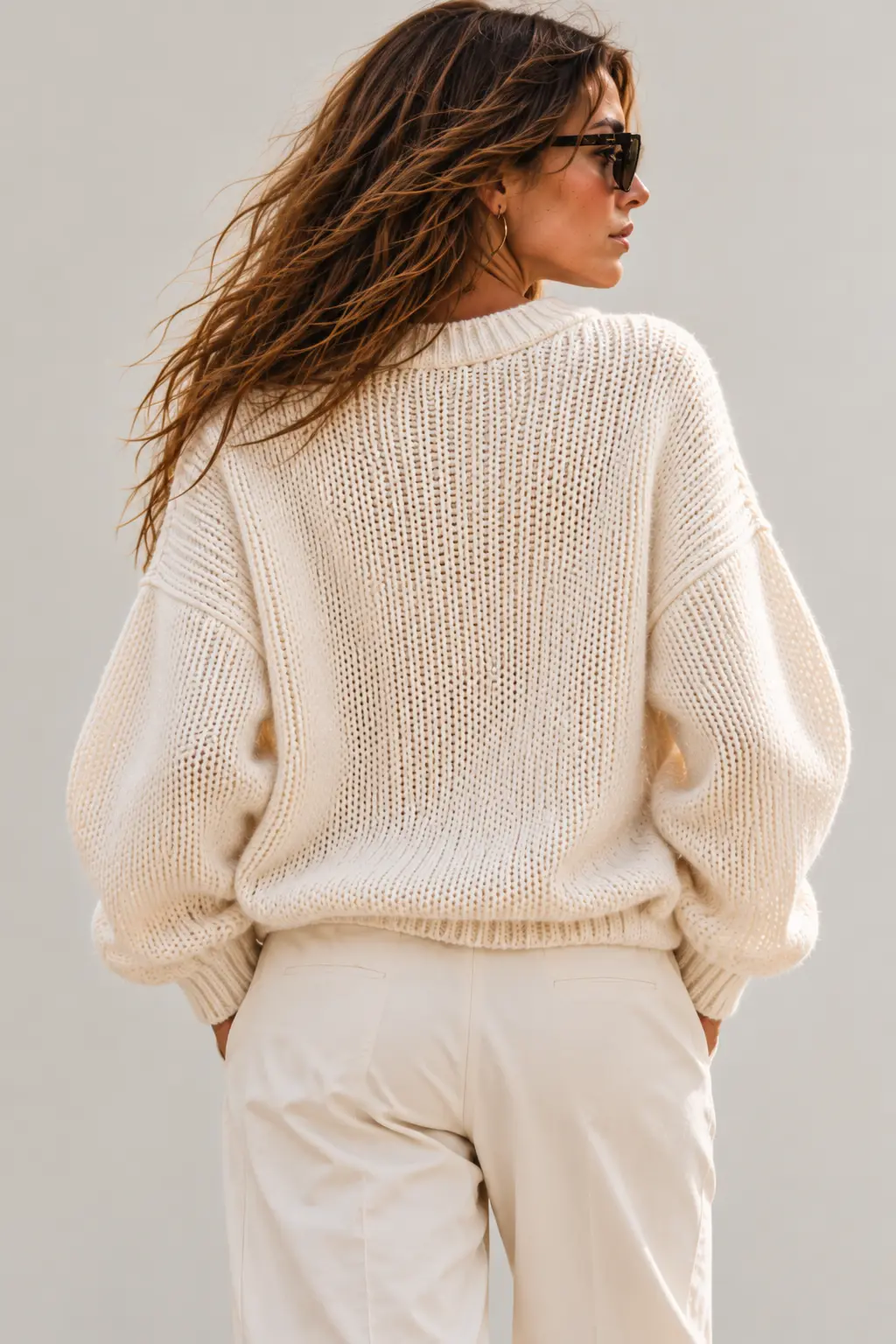 The Ivory Rib Knit Sweater — rear view showing the dropped shoulders